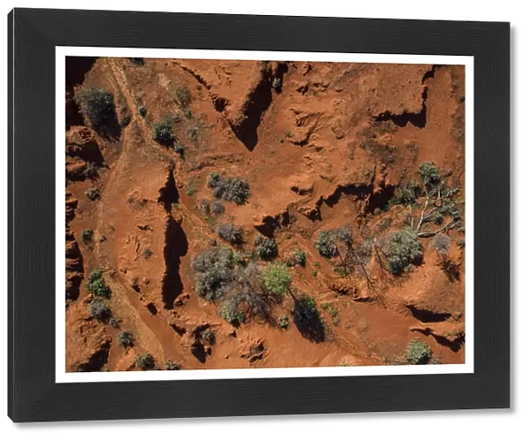 Drone point of view over the red earth of the Australian Outback