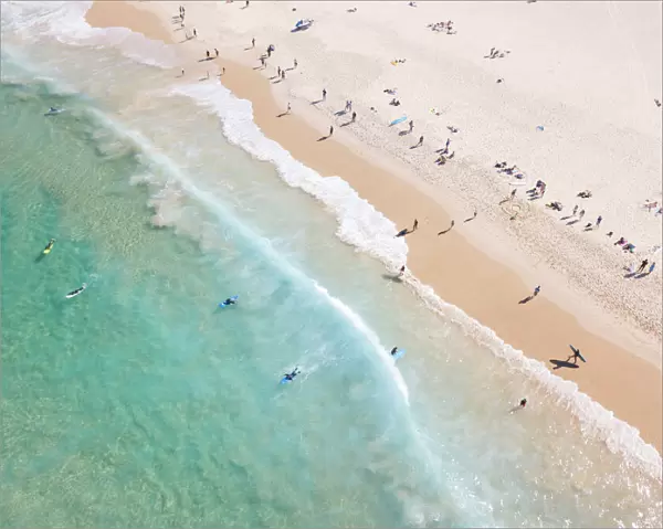 Aerial view of Surfers and people at Iconic Bondi Beach Australia