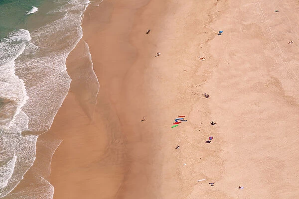 Aerial shot above people enjoying the beach