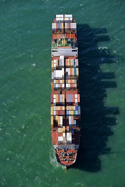 Container ship at sea, aerial view