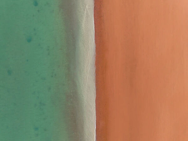 Minimal drone image looking down on the edge of Simpson Beach, Broome, Western Australia, Australia