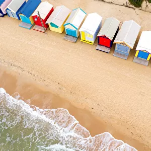 Aerial view of the Brightly Colored Beach Houses on the sand
