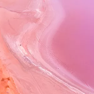 Aerial view of patterns, textures and colors, pink, purple and orange over a Pink Lake