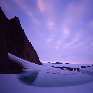 Antarctica, Frames Mountains, Melt Lake below Masson Range, dusk