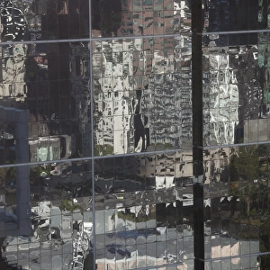 Distorted reflections of city skyscraper in Melbourne, Victoria, Australia