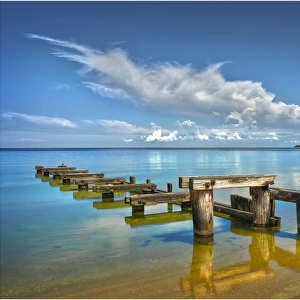 Old and decayed wooden Pier structure at Mentone beach, Victoria, Australia