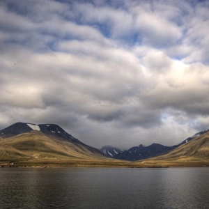 Picturesque Svalbard coastline fjord and mountains