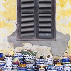 Stacks of Pottery by Window