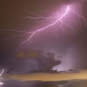 storm clouds over water with lightning