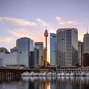 Sunrise View of Cockle Bay Wharf in Darling Harbour and Sydney Tower Eye, New South Wales, Australia