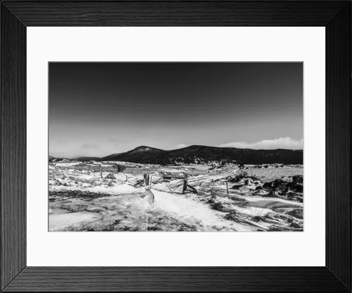 Framed Print : Fence and gate around a small snowy mountain Framed Print : Fence and gate around a small snowy mountain