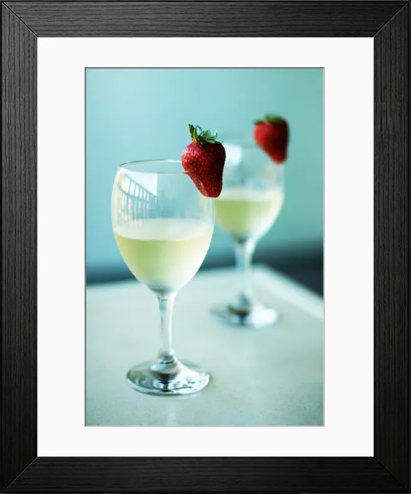 Framed Print : Cheers. Wine glasses with strawberries