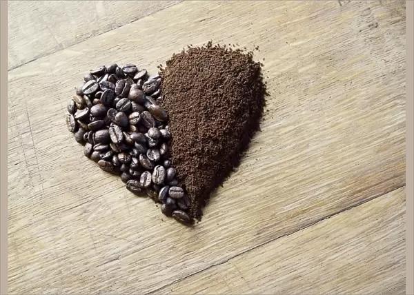 Coffee beans and grounds forming a heart shape
