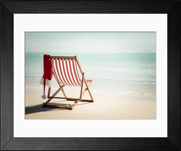 Framed Print : Beach chair with santa hat Framed Print : Beach chair with santa hat