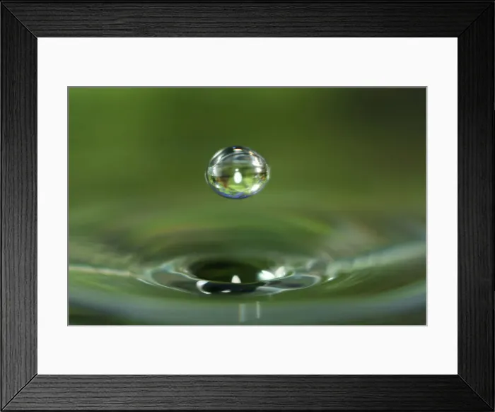 Framed Print : Macro water drop with green background