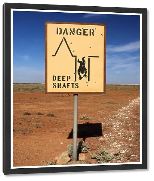 Road sign warning of mine shafts, Coober Pedy, South Australia, Australia