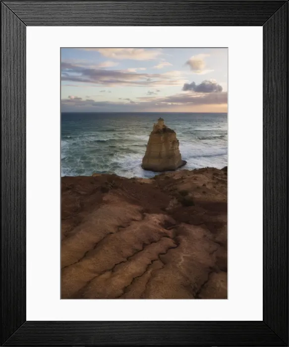 Framed Print : A sea stack below an eroding cliff edge at sunset, Great Ocean Road, Victoria, Australia