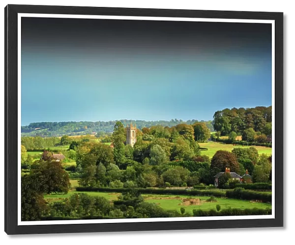View across the countryside and a small village in Somerset, England, United kingdom