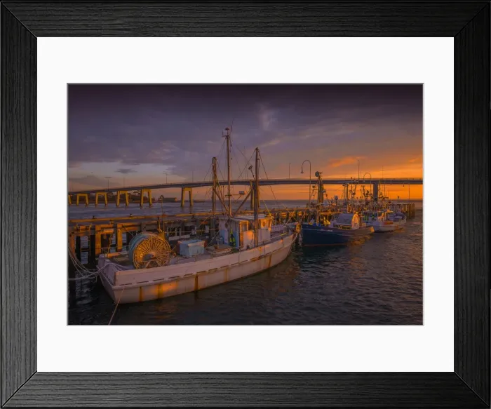 Framed Print : A warm sunrise sweeps over the wharf area at San Remo, Victoria Framed Print : A warm sunrise sweeps over the wharf area at San Remo, Victoria