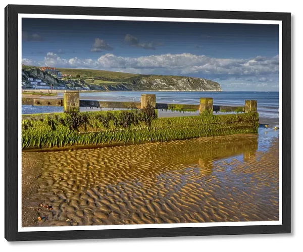 Low tide in the seaside village of Swanage, on the Jurassic coastline of Dorset, England, United Kingdom