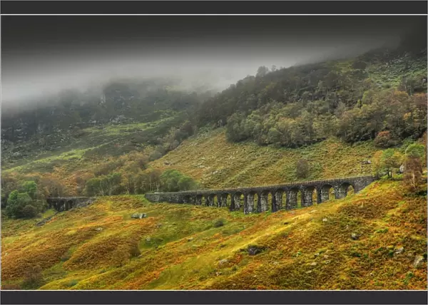 A railway viaduct in mist, near Callander, Scottish highlands