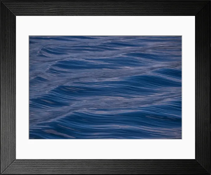 Framed Print : Motion of the tides, Portree harbour, Isle of Skye, Scotland, the United Kingdom