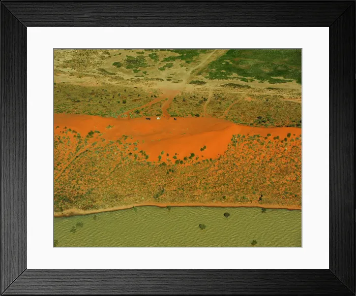 Framed Print : Big red. A massive sand-dune known locally as the Big Red with Flood-waters Framed Print : Big red. A massive sand-dune known locally as the Big Red with Flood-waters