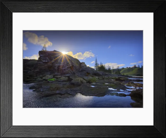 Framed Print : Sunstar at Cemetery bay