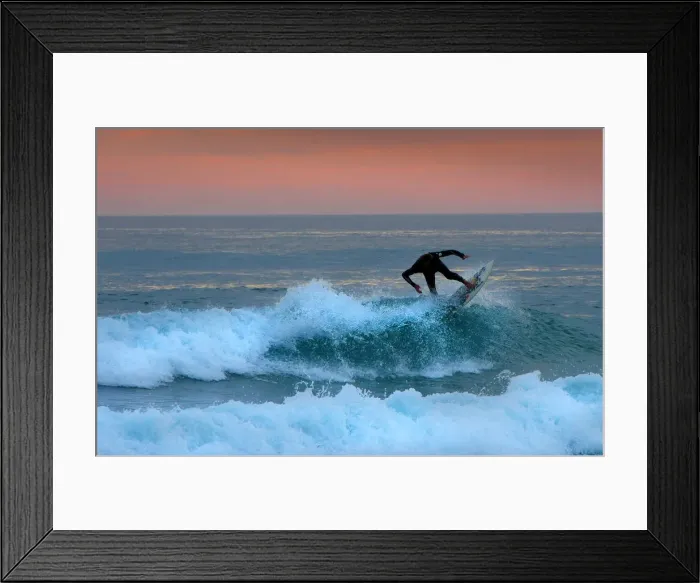 Framed Print : A lone surfer rides a wave at Woolami Beach and coastline, Phillip Island, Victoria, Australia