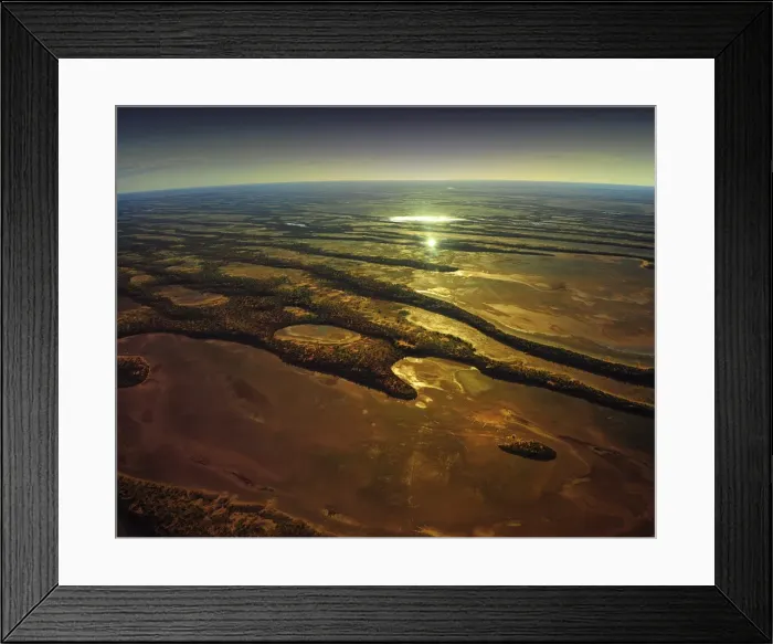 Framed Print : The setting sun in outback South Australia from the air