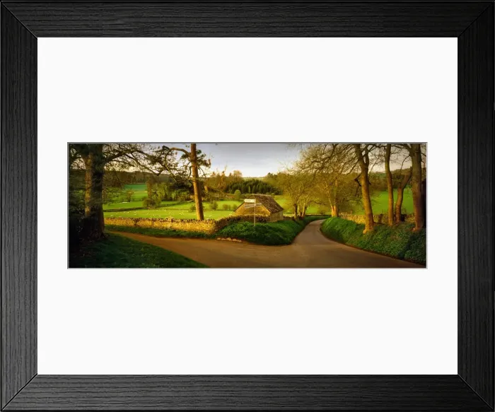 Framed Print : A country lane in the Cotswolds, Gloucestershire, England Framed Print : A country lane in the Cotswolds, Gloucestershire, England