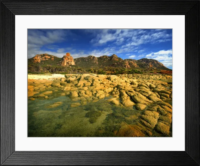 Framed Print : A scenic view at the Docks, a colourful area of coastline on Flinders Island, part of the Furneaux group, eastern Bass Strait, Tasmania