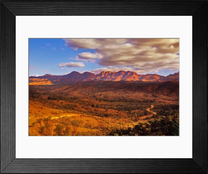 Framed Print : An elevated view, showing the gravel road winding its way through the Bunaroo Valley, Flinders ranges national park, South Australia Framed Print : An elevated view, showing the gravel road winding its way through the Bunaroo Valley, Flinders ranges national park, South Australia