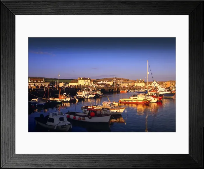 Framed Print : Late summer evening light in West Bay, Jurassic coastline of Dorset, England Framed Print : Late summer evening light in West Bay, Jurassic coastline of Dorset, England