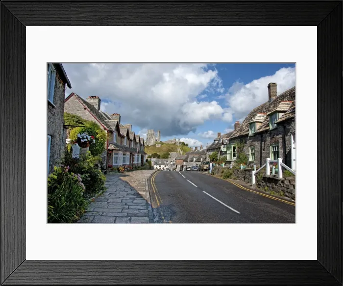 Framed Print : A view down the high Street of Corfe Castle, Isle of Purbeck, Dorset, England Framed Print : A view down the high Street of Corfe Castle, Isle of Purbeck, Dorset, England