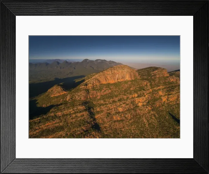 Framed Print : An aerial view of the rugged and scenically beautiful mountain ranges of Wilpena Pound in the southern region of the Flinders Ranges National Park in South Australia Framed Print : An aerial view of the rugged and scenically beautiful mountain ranges of Wilpena Pound in the southern region of the Flinders Ranges National Park in South Australia