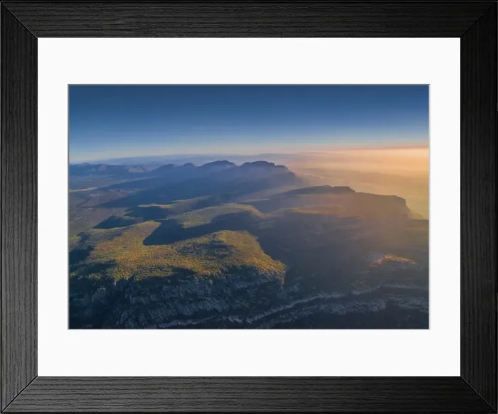 Framed Print : An aerial view of the rugged and scenically beautiful mountain ranges of Wilpena Pound in the southern region of the Flinders Ranges National Park in South Australia Framed Print : An aerial view of the rugged and scenically beautiful mountain ranges of Wilpena Pound in the southern region of the Flinders Ranges National Park in South Australia
