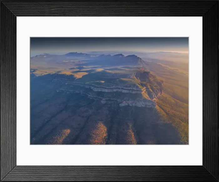 Framed Print : An aerial view of the rugged and scenically beautiful mountain ranges of Wilpena Pound in the southern region of the Flinders Ranges National Park in South Australia Framed Print : An aerial view of the rugged and scenically beautiful mountain ranges of Wilpena Pound in the southern region of the Flinders Ranges National Park in South Australia