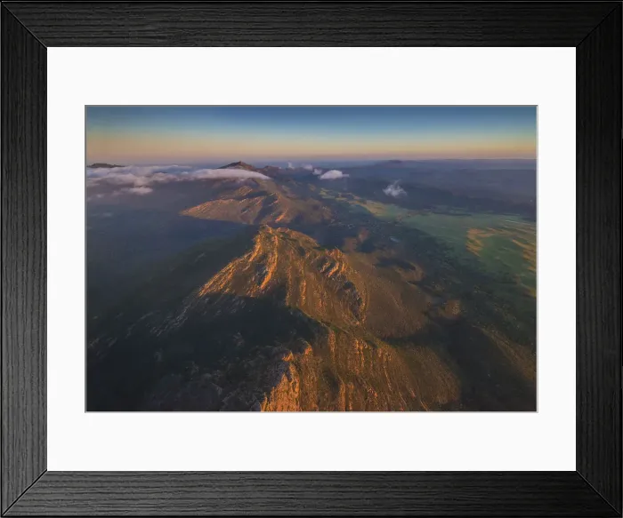 Framed Print : An aerial view of the rugged and scenically beautiful mountain ranges of Wilpena Pound in the southern region of the Flinders Ranges National Park in South Australia Framed Print : An aerial view of the rugged and scenically beautiful mountain ranges of Wilpena Pound in the southern region of the Flinders Ranges National Park in South Australia