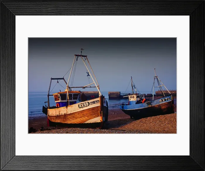 Framed Print : Fishing Trawlers, beached at low tide at Hastings, Kent, England