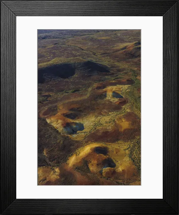 Framed Print : The Painted hills, an area of outstanding natural beauty in the arid region of Anna Creek, outback South Australia