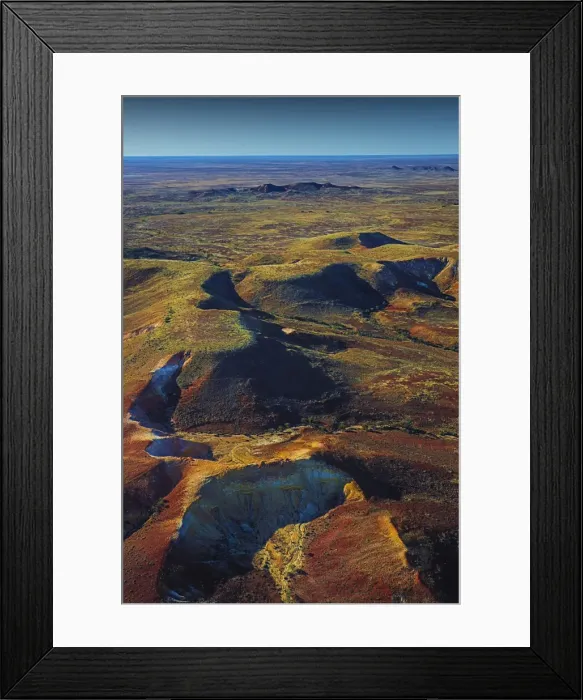 Framed Print : The Painted hills, an area of outstanding natural beauty in the arid region of Anna Creek, outback South Australia Framed Print : The Painted hills, an area of outstanding natural beauty in the arid region of Anna Creek, outback South Australia
