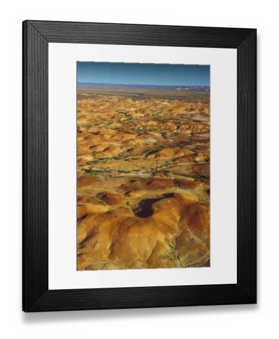 Framed Print : The Painted hills, an area of outstanding natural beauty in the arid region of Anna Creek, outback South Australia Framed Print : The Painted hills, an area of outstanding natural beauty in the arid region of Anna Creek, outback South Australia