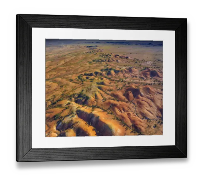 Framed Print : The Painted hills, an area of outstanding natural beauty in the arid region of Anna Creek, outback South Australia Framed Print : The Painted hills, an area of outstanding natural beauty in the arid region of Anna Creek, outback South Australia