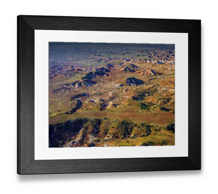 Framed Print : The Painted hills, an area of outstanding natural beauty in the arid region of Anna Creek, outback South Australia Framed Print : The Painted hills, an area of outstanding natural beauty in the arid region of Anna Creek, outback South Australia