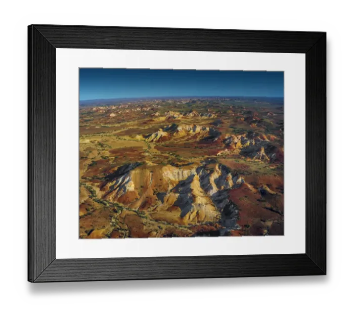 Framed Print : The Painted hills, an area of outstanding natural beauty in the arid region of Anna Creek, outback South Australia Framed Print : The Painted hills, an area of outstanding natural beauty in the arid region of Anna Creek, outback South Australia