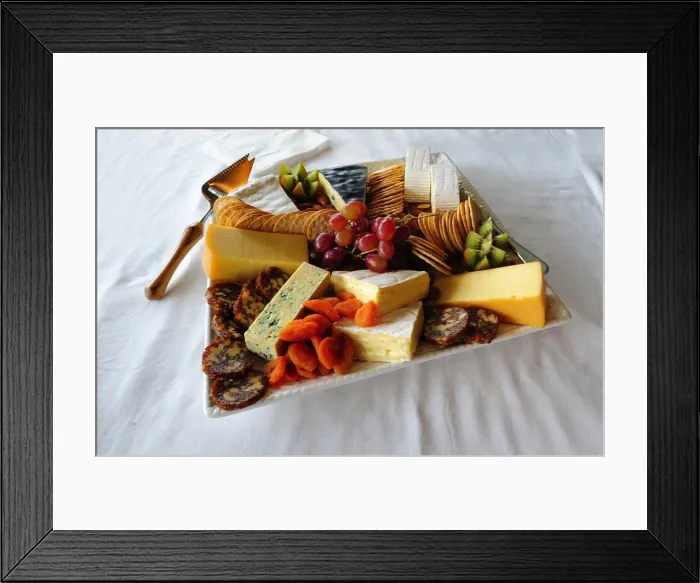 Framed Print : A platter of local King Island produce. Soft and hard cheeses produced in the Cheese factory at Porkies Creek. Bass Strait, Tasmania Framed Print : A platter of local King Island produce. Soft and hard cheeses produced in the Cheese factory at Porkies Creek. Bass Strait, Tasmania