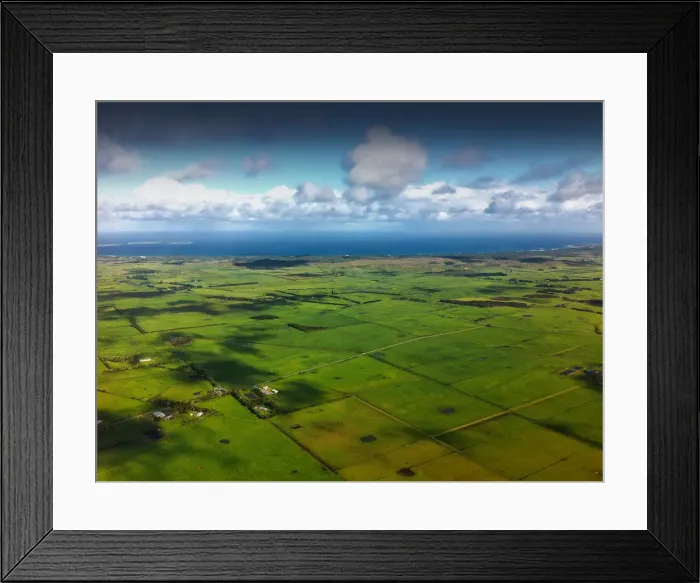 Framed Print : Aerial view of the green undulations and Bass Strait coastline, King Island, Tasmania