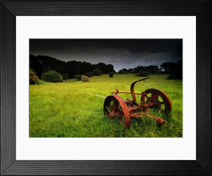 Framed Print : Old farm machinery lays rusting away in a farm paddock near Wybalenna, Flinders Island Tasmania Framed Print : Old farm machinery lays rusting away in a farm paddock near Wybalenna, Flinders Island Tasmania