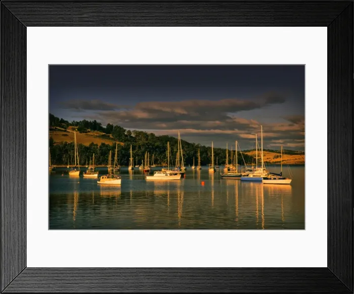 Framed Print : Afternoon light sweeps across the moored boats in the protected and picturesque bay at Kettering, southern Tasmania